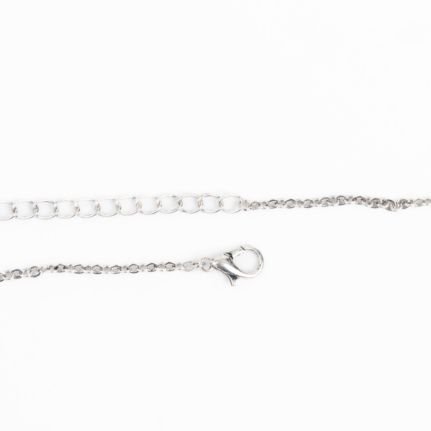 a silver pendant necklace closure