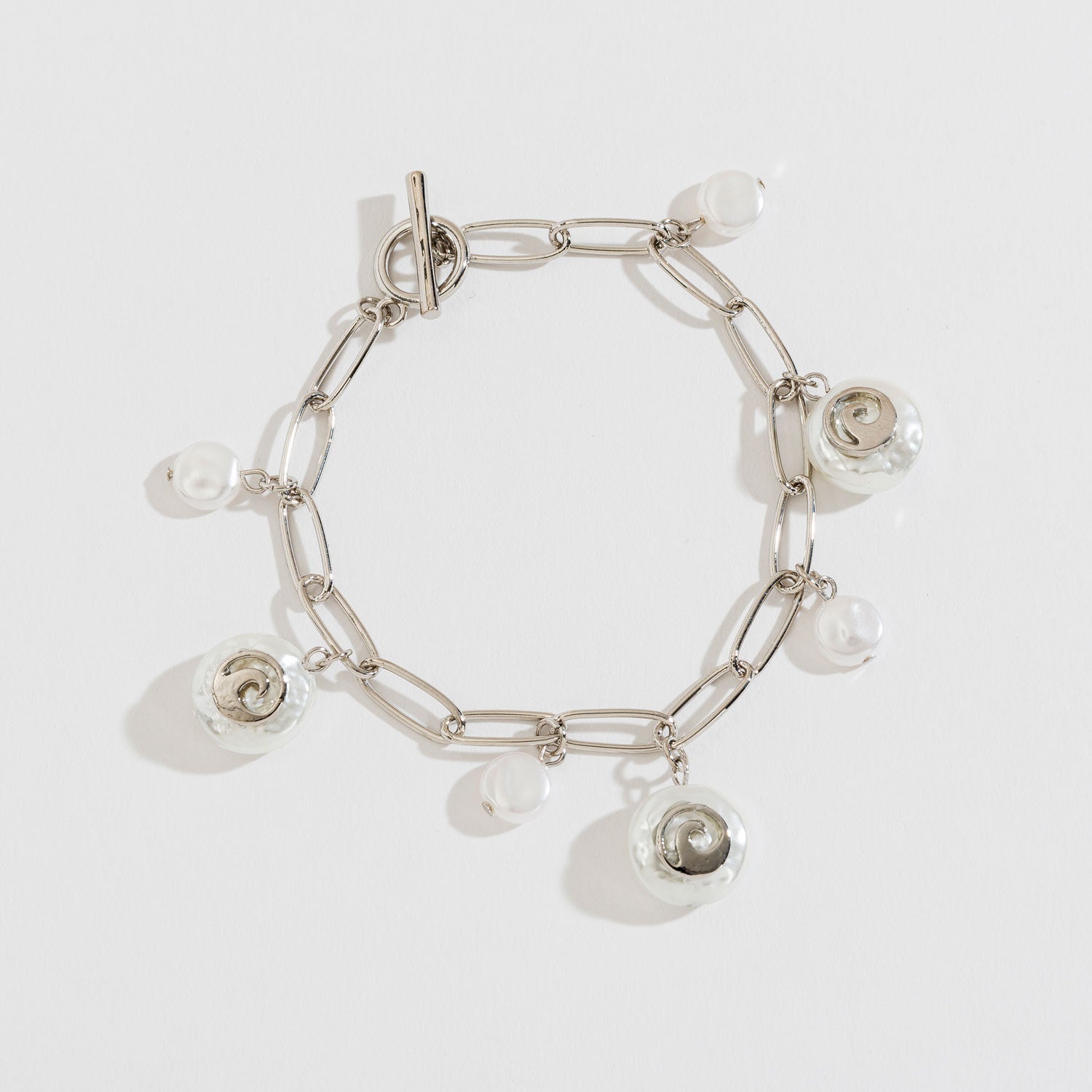 Silver Pearl And Wave Charm Bracelet